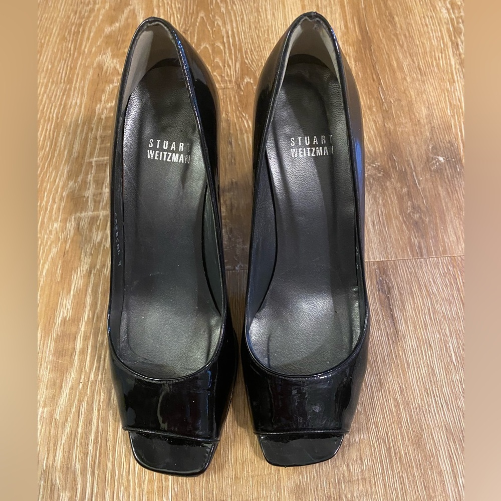 Stuart Weitzman peep toe black parent leather heels.Size 7.5